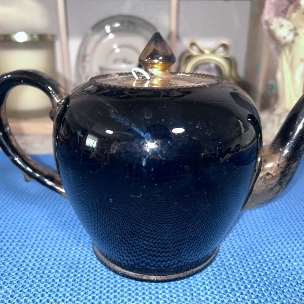 Glossy Black Ceramic Teapot with Gold Accent